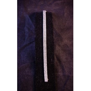 18k white gold and diamond triple line bracelet. Total diamond content 4ct. Price includes nationwide delivery.