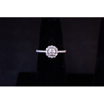 18k white gold and diamond halo solitaire ring with diamond shoulders. Centre diamond .40ct, surrounding diamonds total .38ct. Size L 1/2. Prices include nationwide delivery