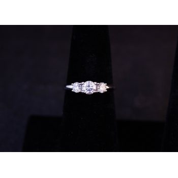 18k white gold 3 stone diamond trilogy ring. Size N, centre diamond .40ct, two side diamonds total .40ct. Price includes nationwide delivery