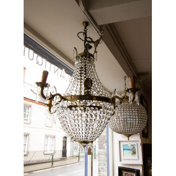 French four arm, eight light bag style brass and crystal chandelier. Measures 80W x 75H cm. Price includes nationwide delivery