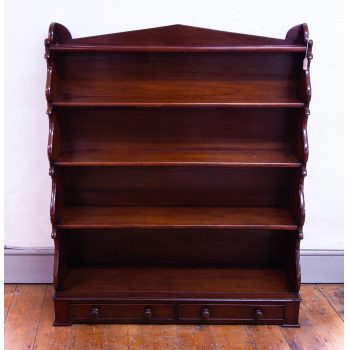 Victorian mahogany waterfall bookshelf with two drawer base. Measures 102W x 31D x 117H in cm. Small old repairs as photographed. Price includes nationwide delivery