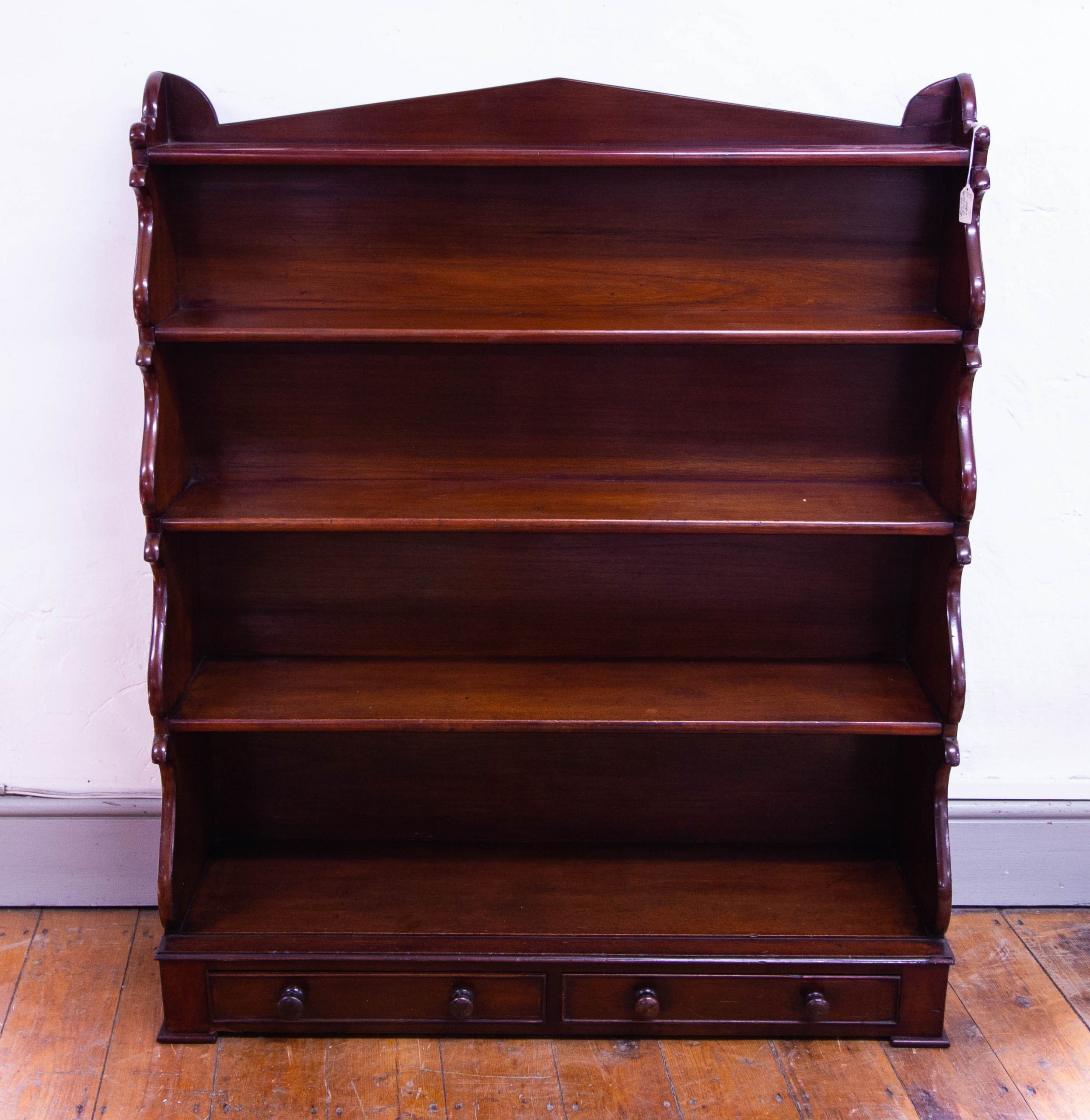 IMG_3646 Victorian mahogany waterfall bookshelf with two drawer base. Measures 102W x 31D x 117H in cm. Small old repairs as photographed. Price includes nationwide delivery