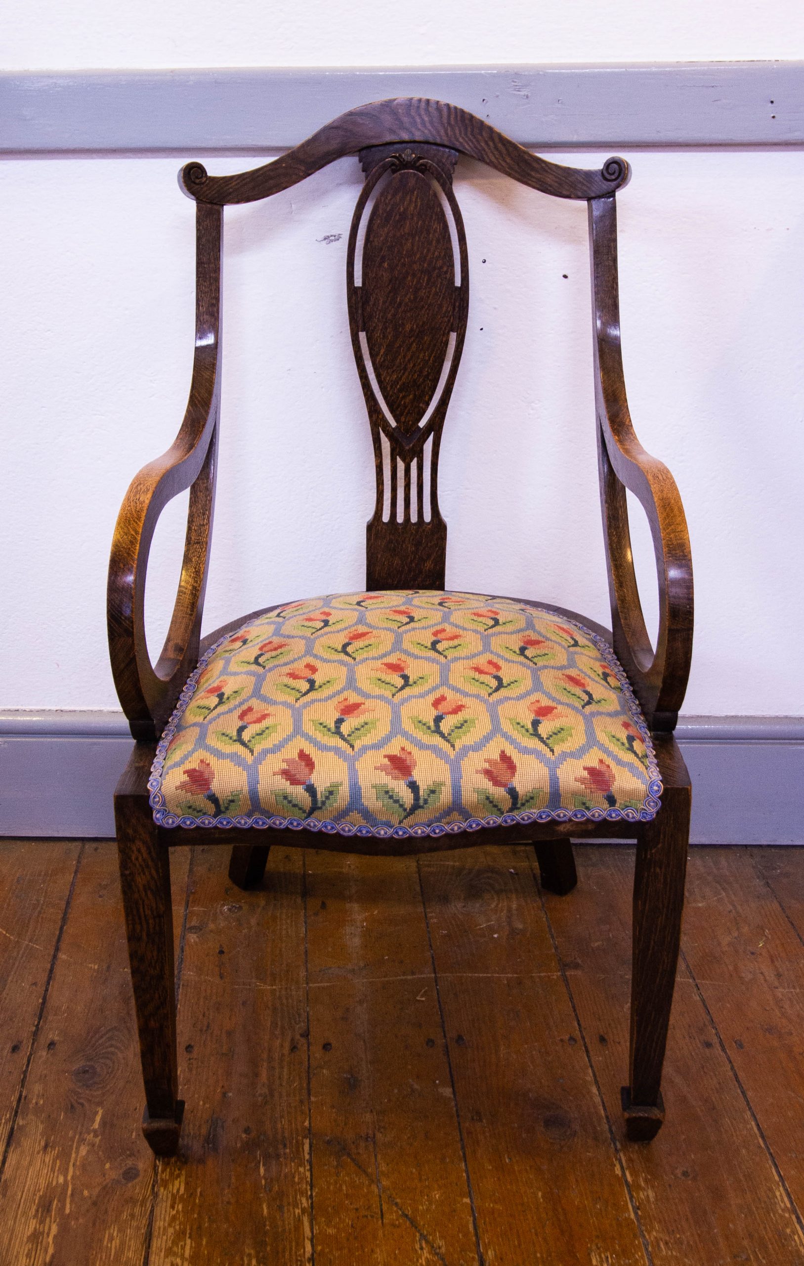 IMG_4709 Oak elbow occasional chair with tulip upholstered seat. Measures 47W x 48D x 40H (seat), 89H (back). Price includes nationwide delivery