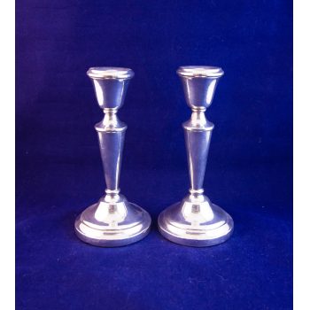 Pair of 6" high silver candlesticks. Stamped Birmingham 1972